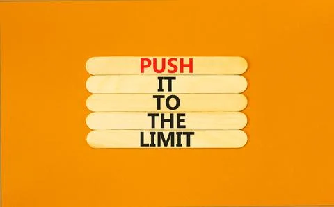 Push it to the limit symbol. Concept words Push it to the limit on wooden s.. Foto stock