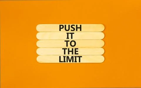 Push it to the limit symbol. Concept words Push it to the limit on wooden s.. Stock Photos