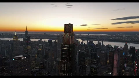 Push In On JPMorgan Chase Tower Against Golden Sunset Over Manhattan Stock Footage 342654591