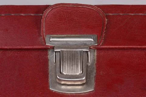 Push latch of the old hardshell suitcase close-up Stock Photos