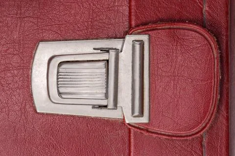 Push latch of the old hardshell suitcase close-up Stock Photos