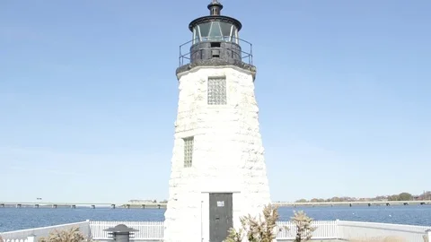 Push in on lighthouse on ocean Stock Footage 79406874