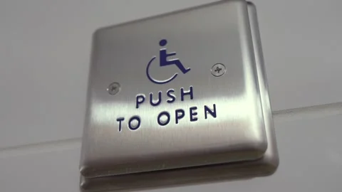 Push to open button for disabled access in public facility 動画素材 314137266
