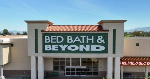 Push out aerial Bed Bath Beyond retail store front empty parking lot Stock Footage 239866784