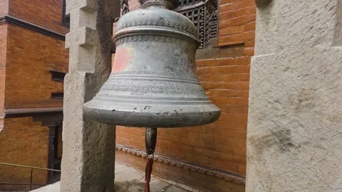Push Out Shot of an Ancient Temple Bell with Intricate Details in 4k Stock Footage 297085913