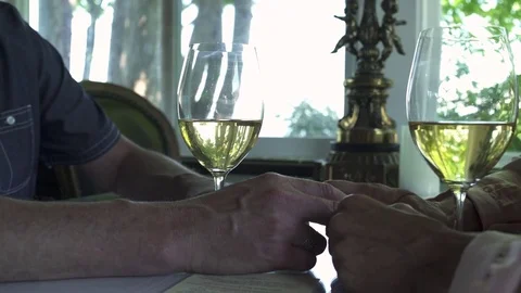 Push-out shot of a couple sitting in a restaurant Stock-Footage 76234145