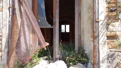 Push out from a window in Faraone Vecchio, Abruzzo Stock Footage 136458925