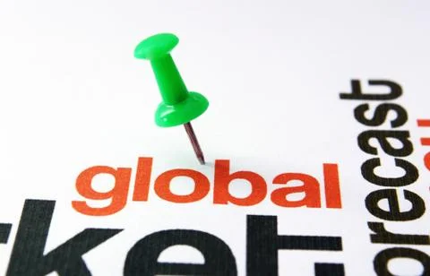 Push pin on global text Stock Photos