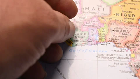 Push Pin Pointing on Cote D' Ivoire The Political World Map Close-Up View Stock Footage 328105631