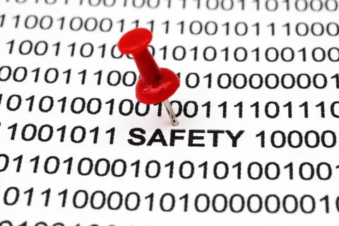 Push pin on safety text 스톡 사진