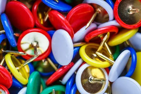 Push pins background.Set of push pins in different colors.Top view. Foto stock
