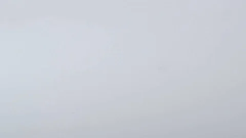 Push pins rolling off camera in slow motion Stock Footage 117350170