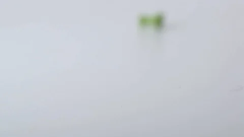 Push pins rolling into focus in slow motion Stock Footage 117350173