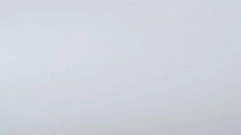 Push pins of various colours falling onto a white surface Stock Footage 117350129