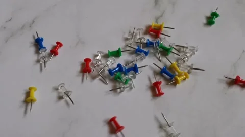 Push Pins on White Background Stock Footage 170028571