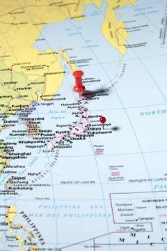 Push pins on world map Foto stock