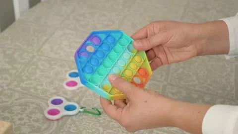 Push pop bubble toys. Sensory toys for kids. Stock Footage 159328348