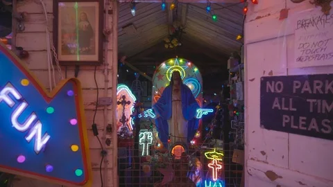 Push in shot art installation of neon jesus Stock Footage 100474854