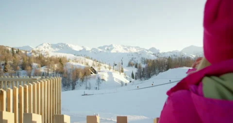 Push In Shot Of Couple Looking At Snowy Mountains Stock Footage 140114679