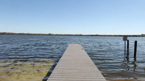 Push in shot of dock at park Video stock 236586192