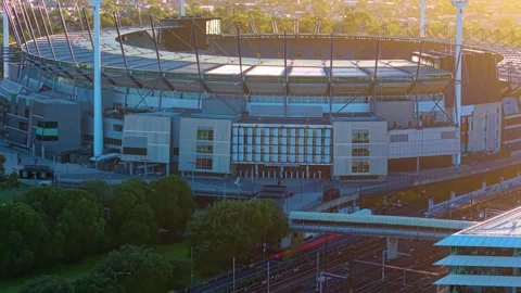 Push in shot of Melbourne Cricket Ground at sunrise Stock Footage 325461857