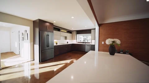 A push in shot over a kitchen island into a modern luxurious kitchen with Stock Footage 287687623