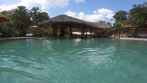 Push shot in pool, at Tabacon Thermal Re... | Stock Video | Pond5