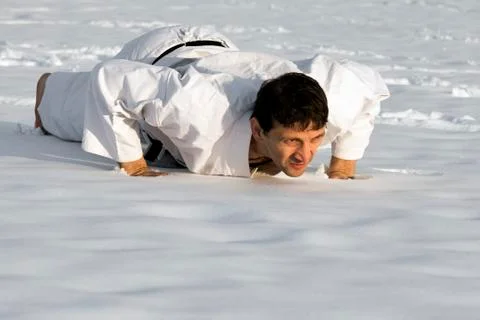 Push up in snow Stock Photos