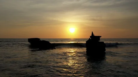 Push in sunset with pagoda on rock Stock Footage 120291017
