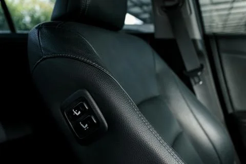Push switch for adjusting the front-passenger seat from the driver's seat Stock Photos