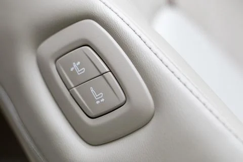 Push switch for adjusting the front-passenger seat from the driver's seat Stock Photos