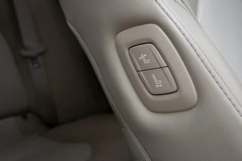 Push switch for adjusting the front-passenger seat from the driver's seat Stock Photos