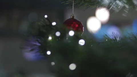 Push through close up of a beautifuly decorated Christmas Tree lit up with Stock Footage 137508527