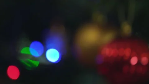 Push through close up of Christmas Ornaments with Lights Stock Footage 138124604