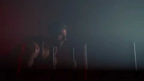 Push through the pain. A diverse athlete uses power to move the immovable. Video stock 239553793