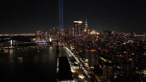 Push in Toward One World Trade Center, 9/11 Tribute in Light on September 11 Stock Footage 345293124
