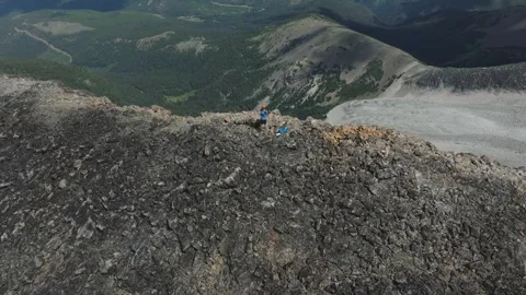 Push Towards and Over Hiker On Summit Stock Footage 314813065
