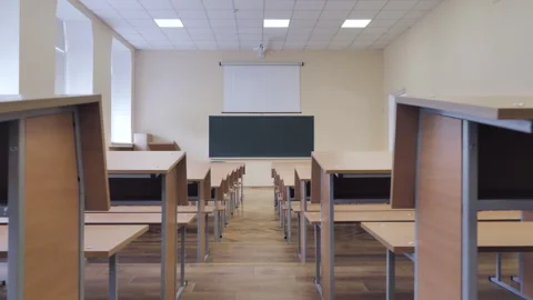 Push In Towards Chalkboard In Empty Lecture Hall, Classroom In University Stock Footage 257226863