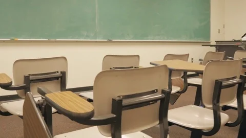 Push in Towards Chalkboard over Empty School Desks Stock Footage 80727793