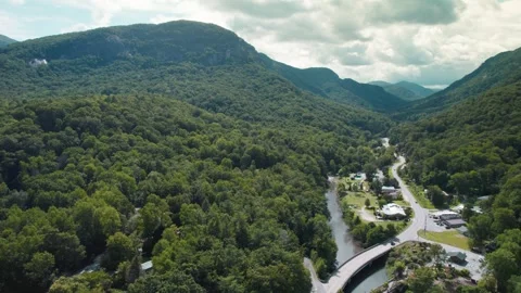 Push towards Chimney Rock from Lake Lure in North Carolina Stock Footage 282800741