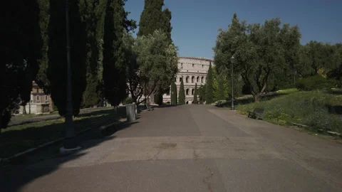 Push in towards the coliseum. rome symbol. sunny day. Video stock 133463499