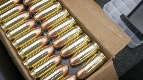 Push in Towards a Full Box of 9mm Bullets Stock Footage 88374856