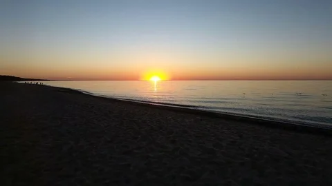 Push in towards Sunset on Lake Stock Footage 69779233