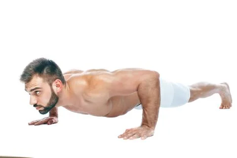 Push ups. bodybuilder posing. Beautiful sporty guy male power. Fitness muscled Stock Photos