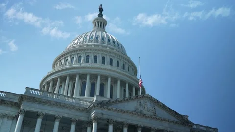 Push into the US Capitol dome with flag at half mast, seat of government in Video stock 213263992