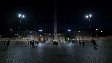 Push in view of Piazza del Popolo in Rome floodlit at night Stock Footage 134549056