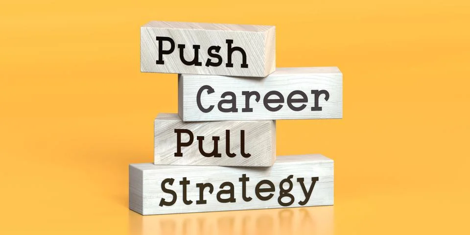 Push vs pull strategy - words on wooden blocks Illustrazione stock