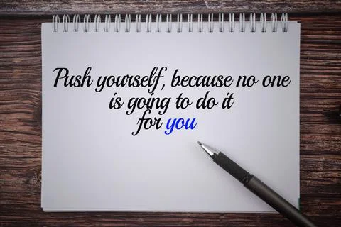Push yourself,because no one is going to do it for you wording on a wooden ba Stock Photos