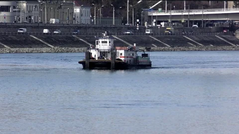 A pusher cruises on the Danube river Vidéo 119335074
