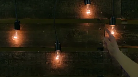 Pushes the light bulb Stock Footage 82158529